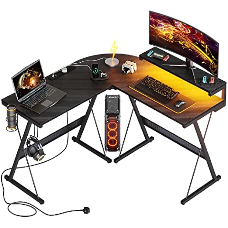 Bestier L Shaped Gaming Desk Computer Desk with LED Lights Monitor Stand 130CM Corner Desk with Cup Holder Headset Hook Ergonomic for Home Office Small Space Carbon Fiber Black With Outlet